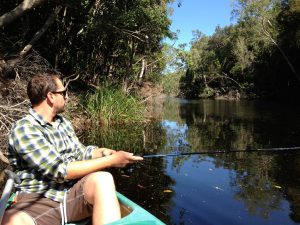Matt fishing from the kayak at Ferns Hideaway Resort, Australia