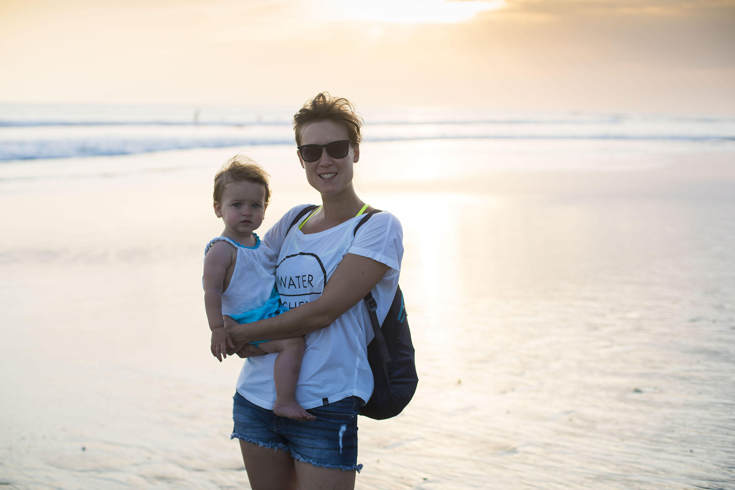 Emily and I on the beach at sunset in Canggu.