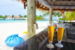 Beer with a beach view in the Maldives.