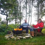 Matt and I sat by the firepit on our glamping trip in Dorset.
