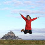 Me jumping in front of Mont Saint Michel