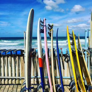 Fun watersports in Menorca include Stand Up Paddle Boarding