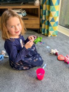 Emily playing the Five Minute Mum toy tombola game