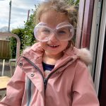 Emily wearing safety goggles for our volcano experiment