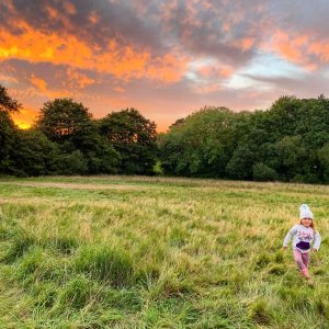 Emily exploring Benville Manor campsite, Dorset