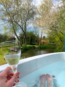 Glamping in style, the hot tub at Lady's Well Shepherd's Hut in Somerset.