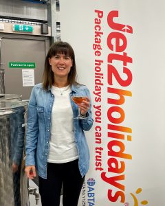 Nicola Dunkinson at Jet2 event at Wyrd Spirits holding Negroni Cocktail